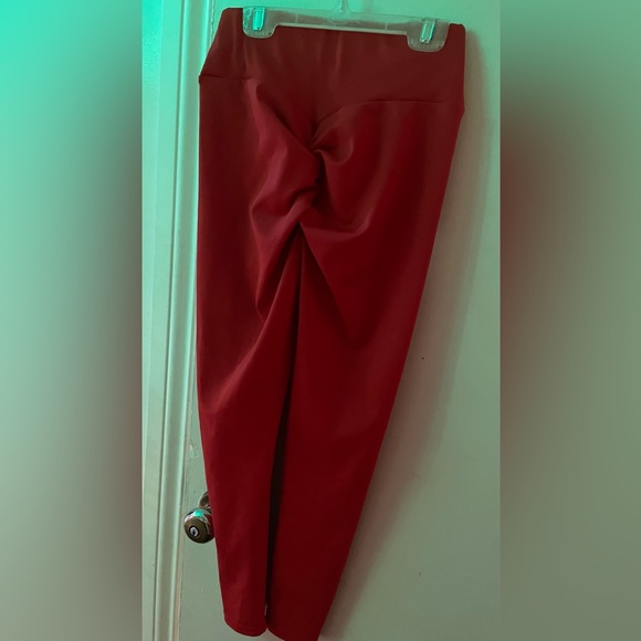 Red DC leggins size small never worn because they never fit me - Picture 2 of 2